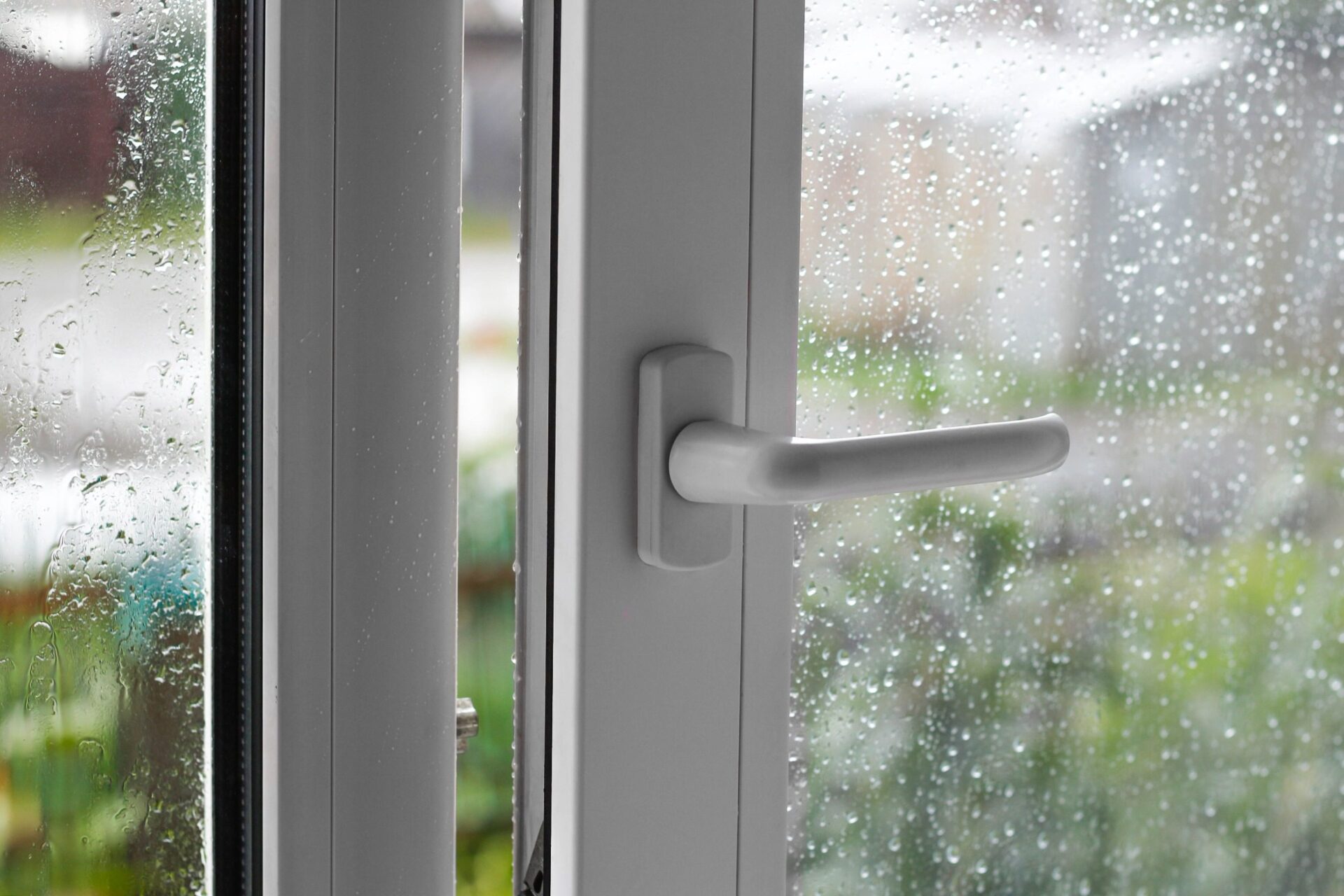 Rain drops on the white window